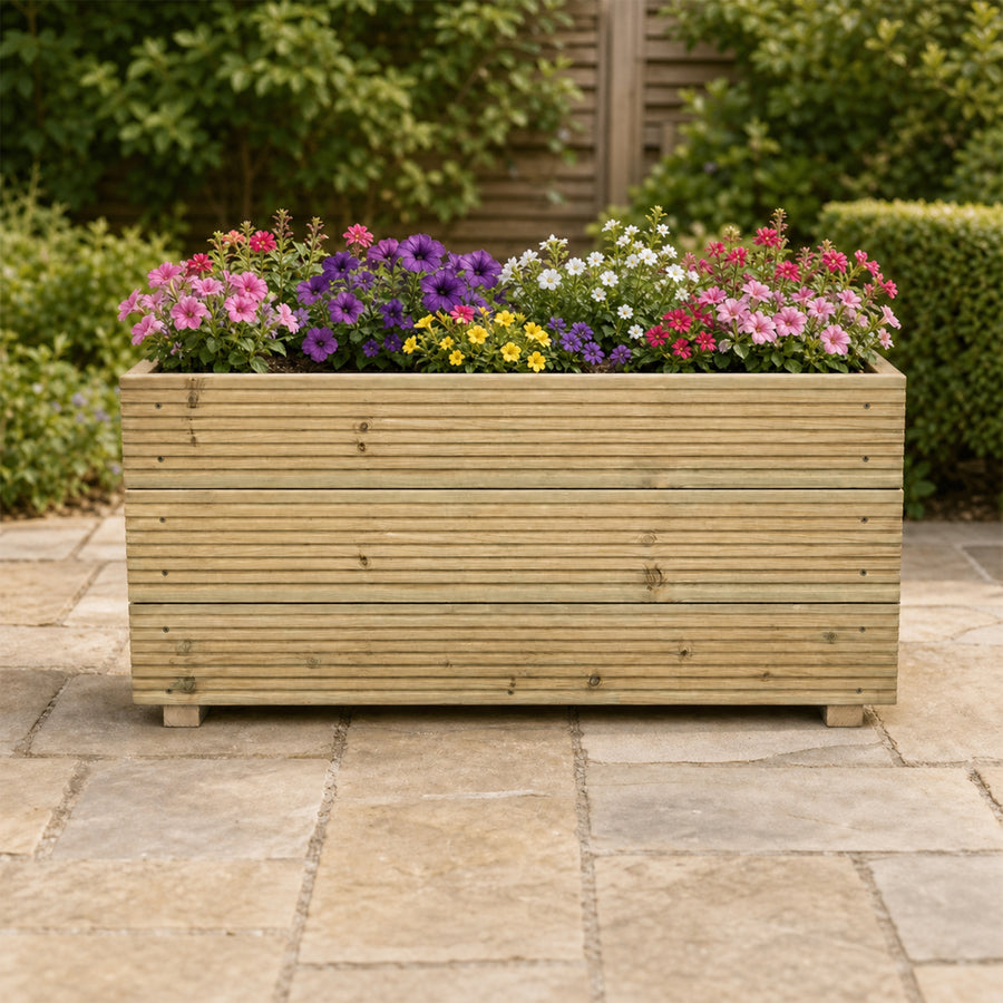 1 m Wooden Decking Planter – Triple – Board 100 × 35 × 48 cm planted with colourful flowers