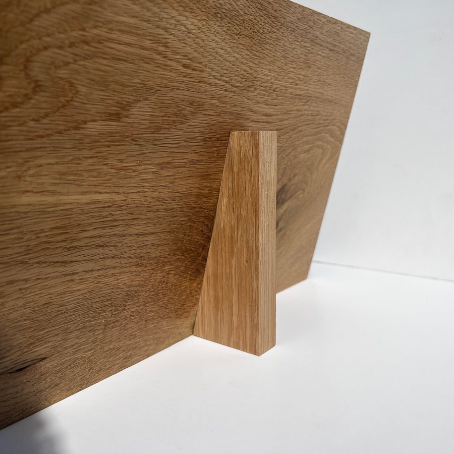 Rear view of an oak plaque with a wooden display stand