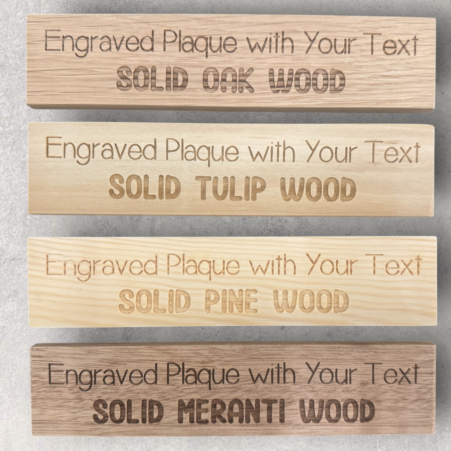 Engraved plaque samples in oak, tulipwood, pine and meranti