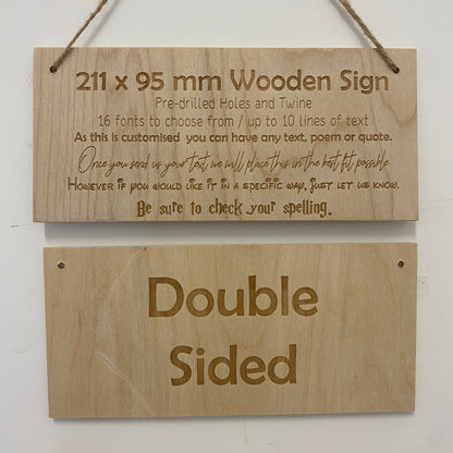 Front and reverse of a double-sided wooden sign with twine hanging cord