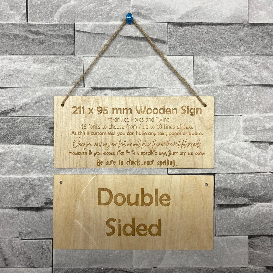 Double-sided wooden hanging sign showing front and reverse engraving
