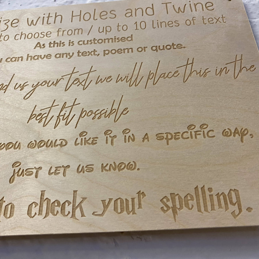 Close-up of sample fonts and layout on a personalised wooden sign