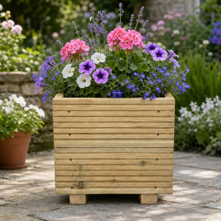 Small Wooden Decking Planter – 35 × 35 × 33 cm planted with colourful flowers