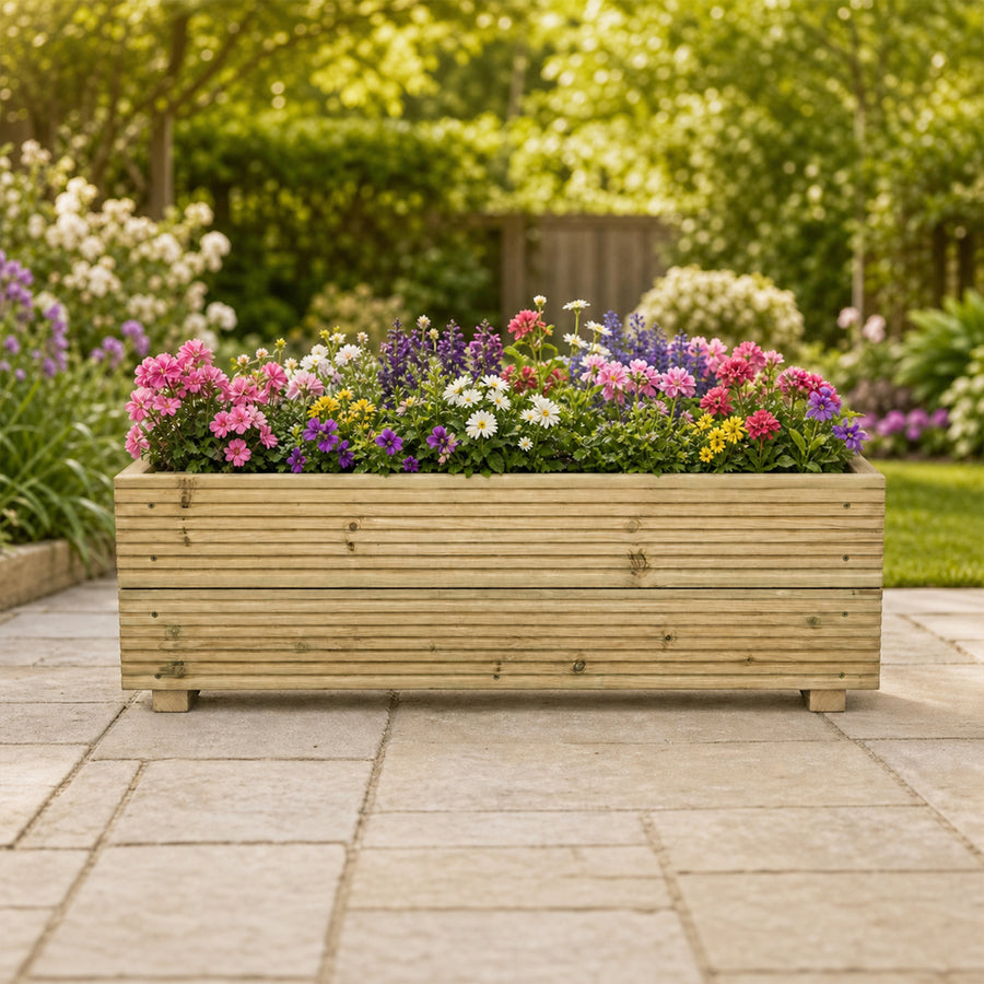 Large Wooden Decking Planter – 88 × 35 × 33 cm planted with colourful flowers