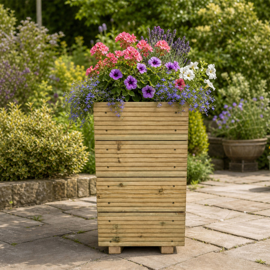 Small Tall Wooden Decking Planter – 35 × 35 × 63 cm planted with colourful flowers